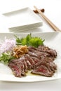 Japanese Seared beef and condiments Royalty Free Stock Photo